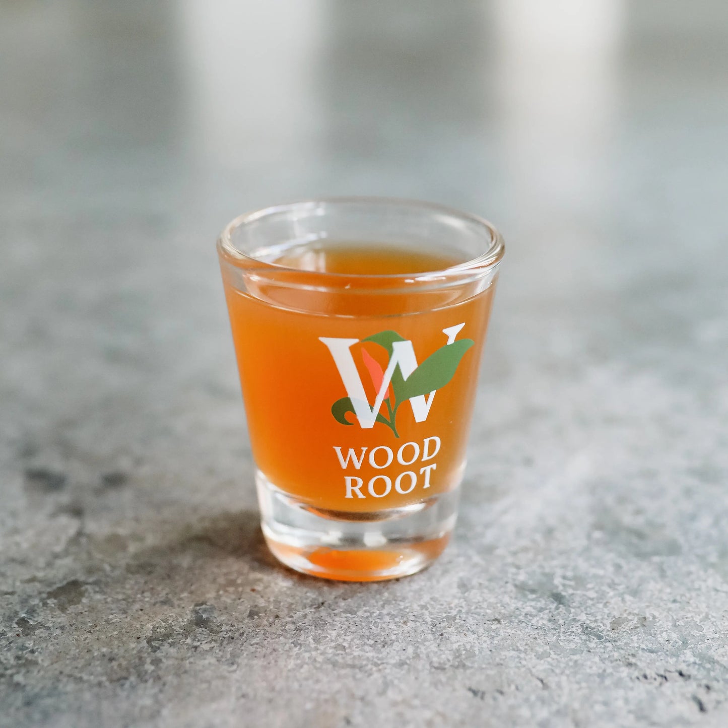 A healthy gut shot of Woodroot Tonic to better gut health. 