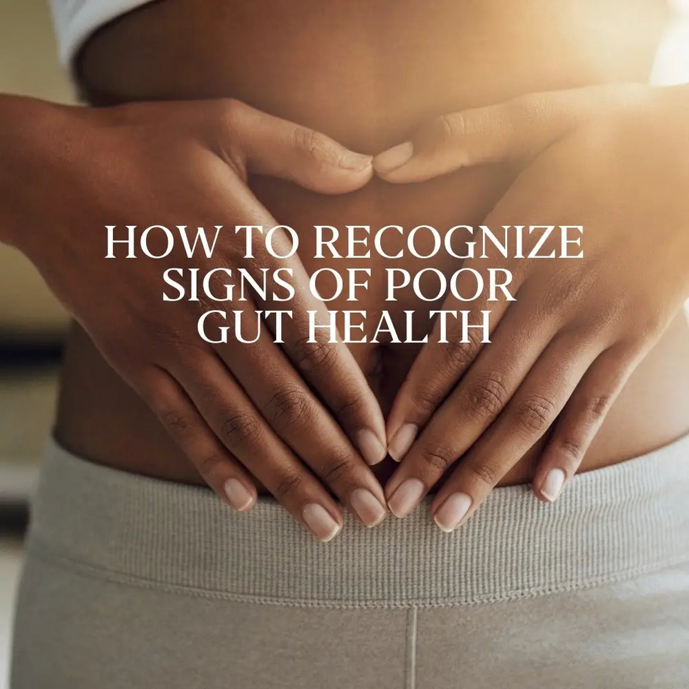 Woman with hands over her stomach as she understands the important of gut health for overall well-being. 