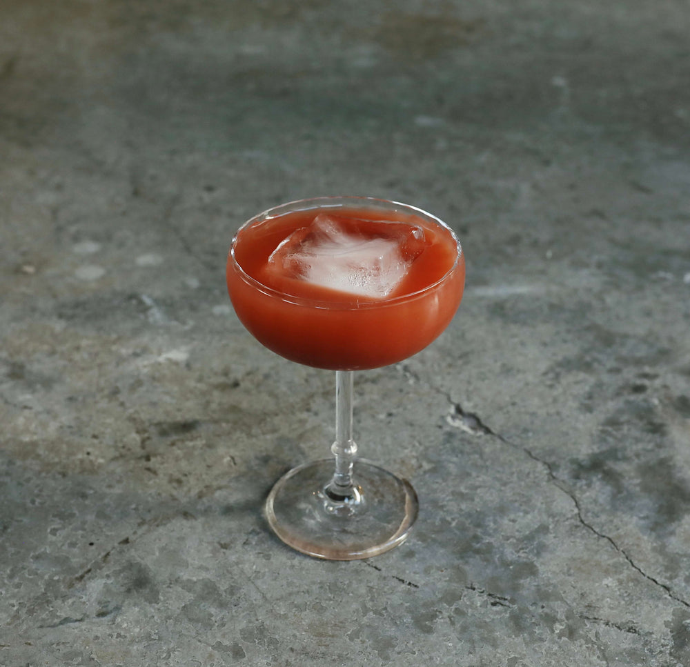Bright red iced drink to promote gut health and sleep.