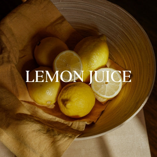 Basket of cut lemons used in the formulation of Woodroot Tonic. 