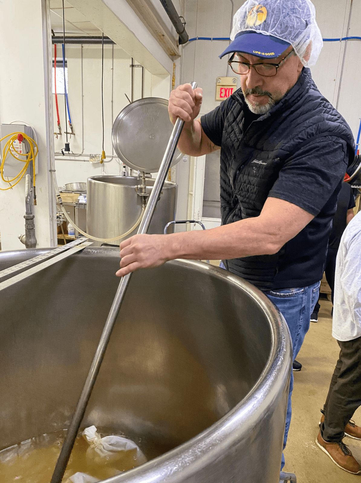 Founder of Morningside Naturals, Jeff Bertone, mixing Woodroot Tonic in the factory. 